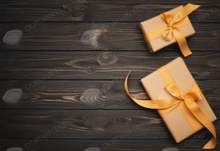 gifts tied with golden ribbon wooden background - title:تاریخچه، معرفی و منابع فایل های استوک - اورچین فایل - format: - sku: - keywords:تاریخچه، معرفی و منابع فایل های استوک,فایل استوک,فایل های استوک,معرفی,منابع فایل های استوک p_id:347137