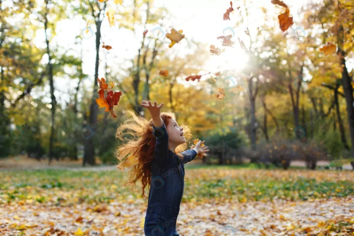autumn vibes child portrait charming red hair lit crcb104cb25 - title:تصویر بازی کودک در پارک پاییزی - اورچین فایل - format:JPG - استوک - sku:crcb104cb25 - keywords: p_id:62562