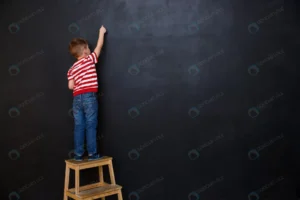 back view cute little kid boy writing with chalk crceb0779e4 size10.73mb 5760x3840 1 - title:Home - اورچین فایل - format: - sku: - keywords: p_id:18