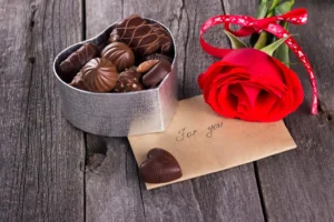 box chocolates red rose dark background crccf5740a9 size11.54mb 5184x3456 - title:Home - اورچین فایل - format: - sku: - keywords: p_id:18