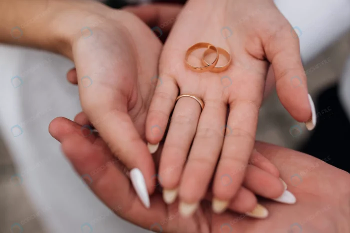 bride groom hold classy golden wedding rings thei crcdd4caf0c size5.5mb 6720x4480 1 - title:عکس حلقه عروس و داماد - اورچین فایل - format:JPG - استوک - sku:crcdd4caf0c - keywords: p_id:44901