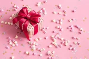 candies gift box with red bow pink surface crc066401b9 size11.25mb 5472x3648 - title:Home - اورچین فایل - format: - sku: - keywords: p_id:18