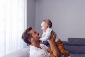 caucasian young dad lifting his loving baby boy w crcf4684a24 size10.58mb 7241x4828 - title:Home - اورچین فایل - format: - sku: - keywords: p_id:18