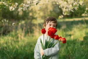 cheerful happy child with tulips flower bouquet n crcc10fe455 size9.84mb 6000x4000 - title:Home - اورچین فایل - format: - sku: - keywords: p_id:18