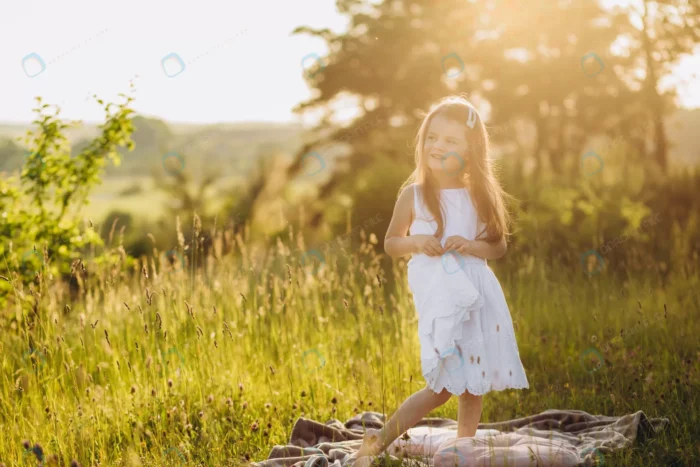 cheerful happy little girl with arms outstretched crc5f3935bd - title:تصویر استوک دختر بچه زیبا در طبیعت - اورچین فایل - format:JPG - استوک - sku:crc5f3935bd - keywords: p_id:64238