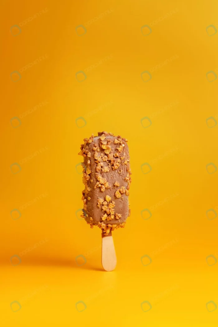 chocolate ice cream popsicle yellow background crce75ac89a - title:عکس بستنی شکلاتی چوبی - اورچین فایل - format:JPG - استوک - sku:crce75ac89a - keywords: p_id:62348