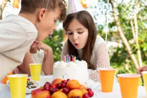 close up friends blowing out candles rnd677 frp16614139 - title:Home - اورچین فایل - format: - sku: - keywords: p_id:18