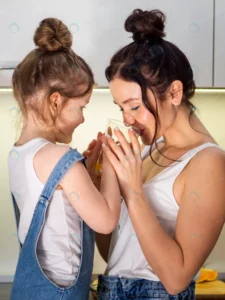 close up mother young girl drinking orange juice crc760b765f size5.20mb 2485x3313 - title:Home - اورچین فایل - format: - sku: - keywords: p_id:18