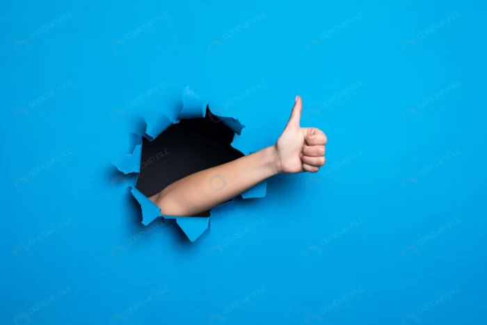 close up woman hand with thumbs up gesture throug crc57e9c80d - title:تصویر دست در حالت لایک کردن - اورچین فایل - format:JPG - استوک - sku:crc57e9c80d - keywords: p_id:90417