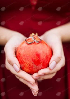 closeup woman holding pomegranate with wedding ri crc29a699c6 size6.54mb 3840x5376 - title:Home - اورچین فایل - format: - sku: - keywords: p_id:18