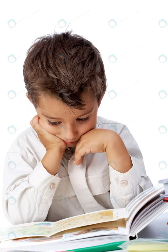 concentrated schoolboy reading book crc74f96241 size5.76mb 2800x4200 1 - title:تصویر استوک کودک در حال مطالعه - اورچین فایل - format:JPG - استوک - sku:crc74f96241 - keywords: p_id:46509