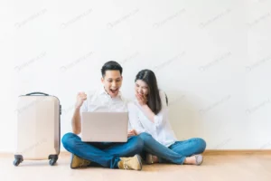 couple with laptop celebrating successful plannin crcfae936b1 size5.61mb 6016x4016 - title:Home - اورچین فایل - format: - sku: - keywords: p_id:18