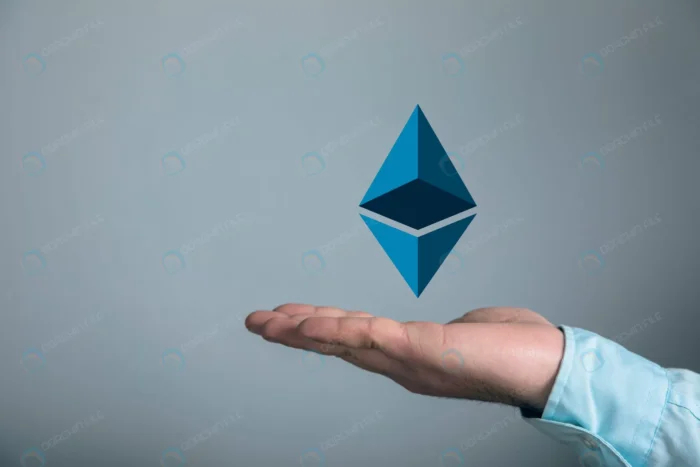 cryptocurrency icon man holding his hand rnd945 frp31959563 - title:تصویر نماد اتریوم در دست مرد - اورچین فایل - format:JPG - استوک - sku:frp31959563 - keywords: p_id:72437