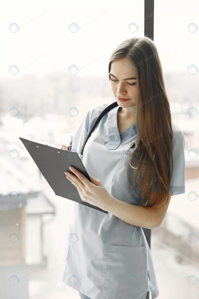 doctor blue uniform girl with stethoscope around crc85beb478 - title:تصویر استوک خانم دکتر با یونیفرم آبی - اورچین فایل - format:JPG - استوک - sku:crc85beb478 - keywords: p_id:51773