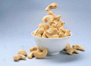 falling cashew nuts into bowl with copy space crc211152d3 size12.86mb 5404x3901 - title:Home - اورچین فایل - format: - sku: - keywords: p_id:18