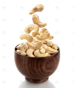 falling cashew nuts into wooden bowl isolated whi crc895efdab size5.15mb 3856x4585 - title:Home - اورچین فایل - format: - sku: - keywords: p_id:18