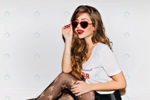 fashionable young woman with red lips holding fun crc39a125a1 size8.44mb 5760x3840 - title:Home - اورچین فایل - format: - sku: - keywords: p_id:18