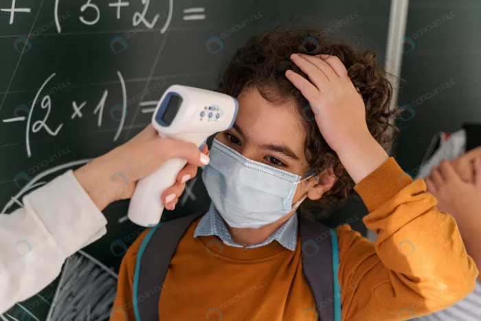 female teacher checking student s temperature sch crcfc723975 - title:کنترل تب دانش آموزان در کلاس - اورچین فایل - format:JPG - استوک - sku:crcfc723975 - keywords: p_id:39926