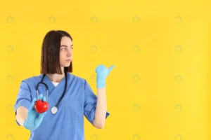 female trainee nurse with heart yellow background crc3234ab76 size7.91mb 6720x4480 - title:Home - اورچین فایل - format: - sku: - keywords: p_id:18