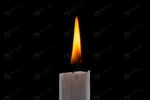 front view burning candle dark surface crc06fc0628 size2.20mb 5600x3737 - title:Home - اورچین فایل - format: - sku: - keywords: p_id:18