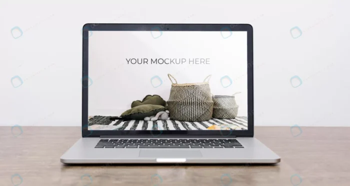 front view laptop mock up interior decoration crc82f1368d size134.92mb - title:موکاپ لپ تاپ روی سطح چوبی - اورچین فایل - format:PSD - فتوشاپ - sku:crc82f1368d - keywords: p_id:83199