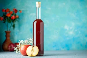 front view red apple vinegar blue background food crc98231214 size8.8mb 5600x3733 1 - title:Home - اورچین فایل - format: - sku: - keywords: p_id:18