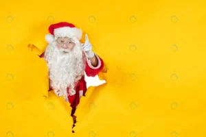 front view santa claus looking through ripped pap crc69b2ccfa size6.21mb 5600x3733 - title:Home - اورچین فایل - format: - sku: - keywords: p_id:18