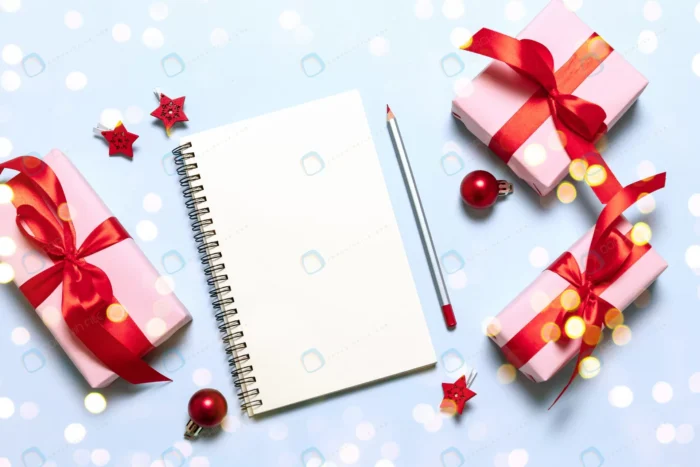 goals plans dreams make list new year winter holiday xmas concept writing notebook - title:دانلود عکس استوک با هدیه های روبان شده قرمز، دفتر و مداد - اورچین فایل - format:JPG - استوک - sku:5054 - keywords: p_id:30676