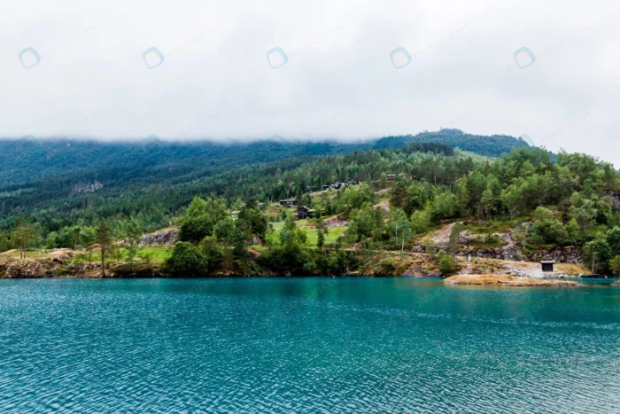 green mountain landscape with blue idyllic lake crcafb56635 - title:تصویر استوک روستای کوهستانی کنار رود - اورچین فایل - format:JPG - استوک - sku:crcafb56635 - keywords:تصویر استوک روستای کوهستانی کنار رود, عکس استوک, تصویر استوک رایگان, دانلود رایگان, طبیعت, فایل تکی, کوه p_id:57658