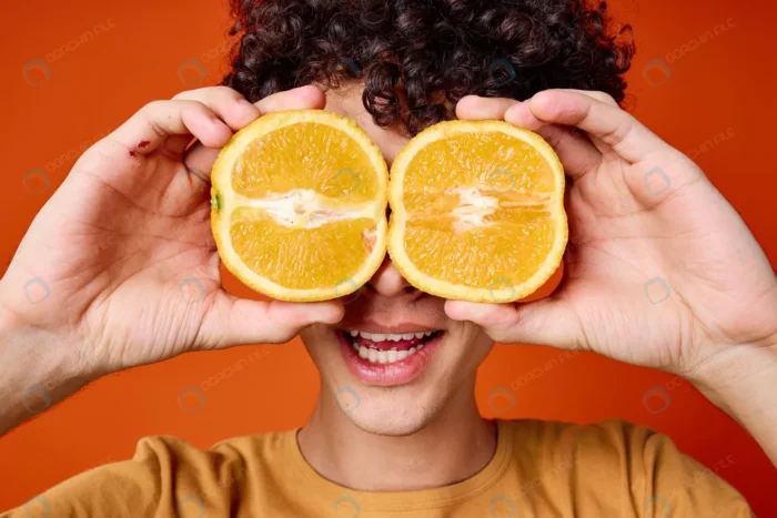 guy with curly hair oranges near face emotions rnd121 frp13586697 - title:پسر با پرتغال روی چشمانش - اورچین فایل - format:JPG - استوک - sku:frp13586697 - keywords: p_id:75017