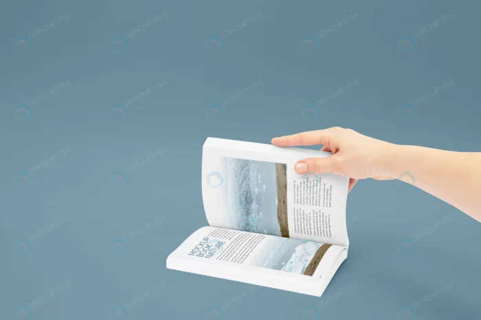 hand holding book mockup 4 crc509ddc7b size63.37mb - title:موکاپ کتاب باز شده در دست خانم - اورچین فایل - format:PSD - فتوشاپ - sku:crc509ddc7b - keywords: p_id:82717