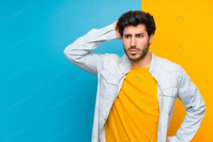 handsome isolated colorful wall having doubts whi crc9b8a2223 size0.15mb 1920x1280 - title:Home - اورچین فایل - format: - sku: - keywords: p_id:18