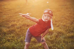 happy kid pilot helmet playing with wooden toy ai crc7f3c61a7 size27.46mb 7191x4799 - title:Home - اورچین فایل - format: - sku: - keywords: p_id:18