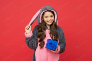 happy kid wear rabbit kigurumi pajamas holding gi crccca843c9 size6.91mb 4928x3280 - title:Home - اورچین فایل - format: - sku: - keywords: p_id:18