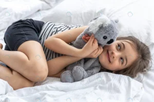 happy little girl with soft toy koala bed crc77852d28 size5.44mb 5472x3648 - title:Home - اورچین فایل - format: - sku: - keywords: p_id:18