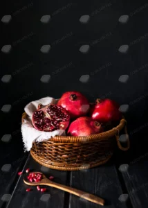 high angle basket with autumn pomegranates copy s crc6dce8e13 size1.15mb 3648x5107 - title:Home - اورچین فایل - format: - sku: - keywords: p_id:18