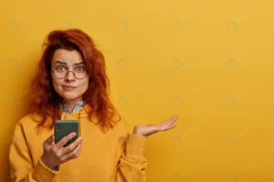 indignant puzzled redhead woman raises palm think crc52c789a1 size16.93mb 8495x5663 - title:Home - اورچین فایل - format: - sku: - keywords: p_id:18