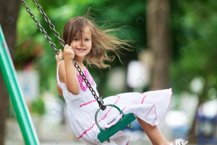 little child blond girl having fun swing crcc89a1899 - title:استوک دختر در حال تاب خوردن - اورچین فایل - format:JPG - استوک - sku:crcc89a1899 - keywords: p_id:64352