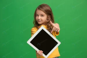 little funny girl with tablet green studio wall crcdb488cdf size11.92mb 5760x3840 - title:Home - اورچین فایل - format: - sku: - keywords: p_id:18