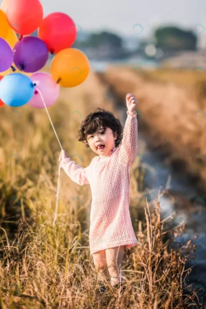 little girl playing with balloons wheat field 2 crc481a381c size8.75mb 3648x5472 - title:Home - اورچین فایل - format: - sku: - keywords: p_id:18