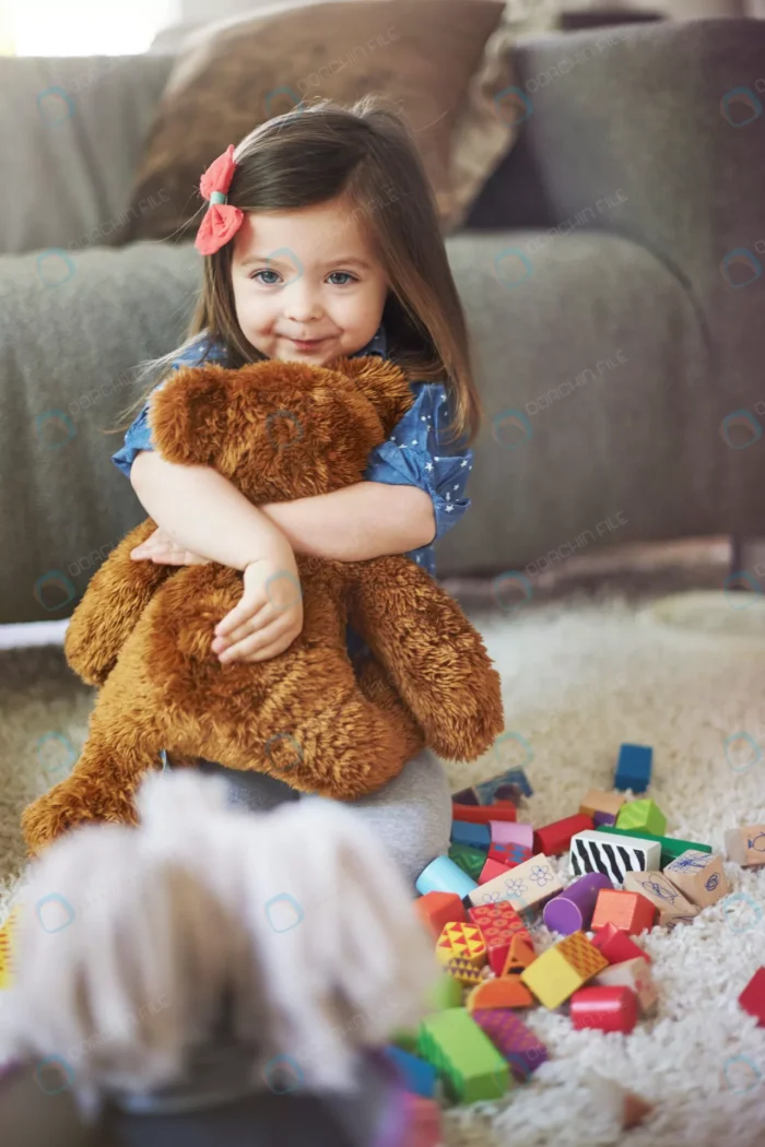 little girl playing with toys living room crcc0f8dd70 - title:تصویر دختر با تدی - اورچین فایل - format:JPG - استوک - sku:crcc0f8dd70 - keywords: p_id:77871