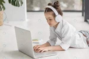 little girl with headphones listening her teacher crc75ba96e3 size1.01mb 5760x3840 - title:Home - اورچین فایل - format: - sku: - keywords: p_id:18