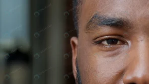 macro shot african american man showing one eye ca rnd714 frp27173020 - title:Home - اورچین فایل - format: - sku: - keywords: p_id:18