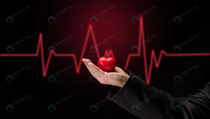 male hand holding red heart dark background early crc70e34ae4 - title:تصویر استوک مرد در حال نگهداری از قلب قرمز - اورچین فایل - format:JPG - استوک - sku:crc70e34ae4 - keywords: p_id:51842