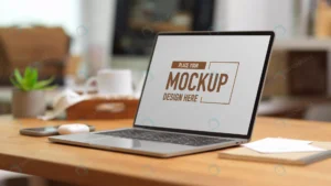 mockup laptop wooden table with office supplies st rnd663 frp10467259 - title:Home - اورچین فایل - format: - sku: - keywords: p_id:18