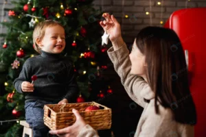 mother teaching son how decorate christmas tree crc57eed892 size6.93mb 4496x2998 - title:Home - اورچین فایل - format: - sku: - keywords: p_id:18