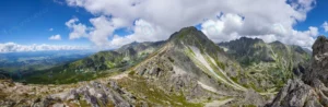 mountain stone range peak against blue cloudy sky crc454db2ce size26.12mb 8792x2883 - title:Home - اورچین فایل - format: - sku: - keywords: p_id:18