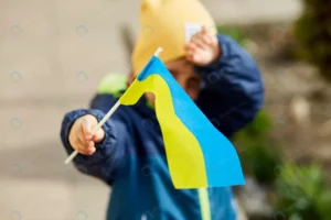 patriotic little boy holds ukrainian flag stand wi rnd971 frp31930723 - title:Home Main - اورچین فایل - format: - sku: - keywords: p_id:18