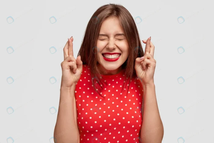 pleased attractive european woman makes wish win crc6db3e130 size13.49mb 8495x5663 1 - title:تصویر استوک دختر جوان خوشحال با لباس قرمز - اورچین فایل - format:JPG - استوک - sku:crc6db3e130 - keywords: p_id:49148