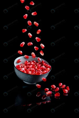 pomegranate seeds falling into bolw crcff0697be size3.44mb 4000x6000 - title:Home - اورچین فایل - format: - sku: - keywords: p_id:18